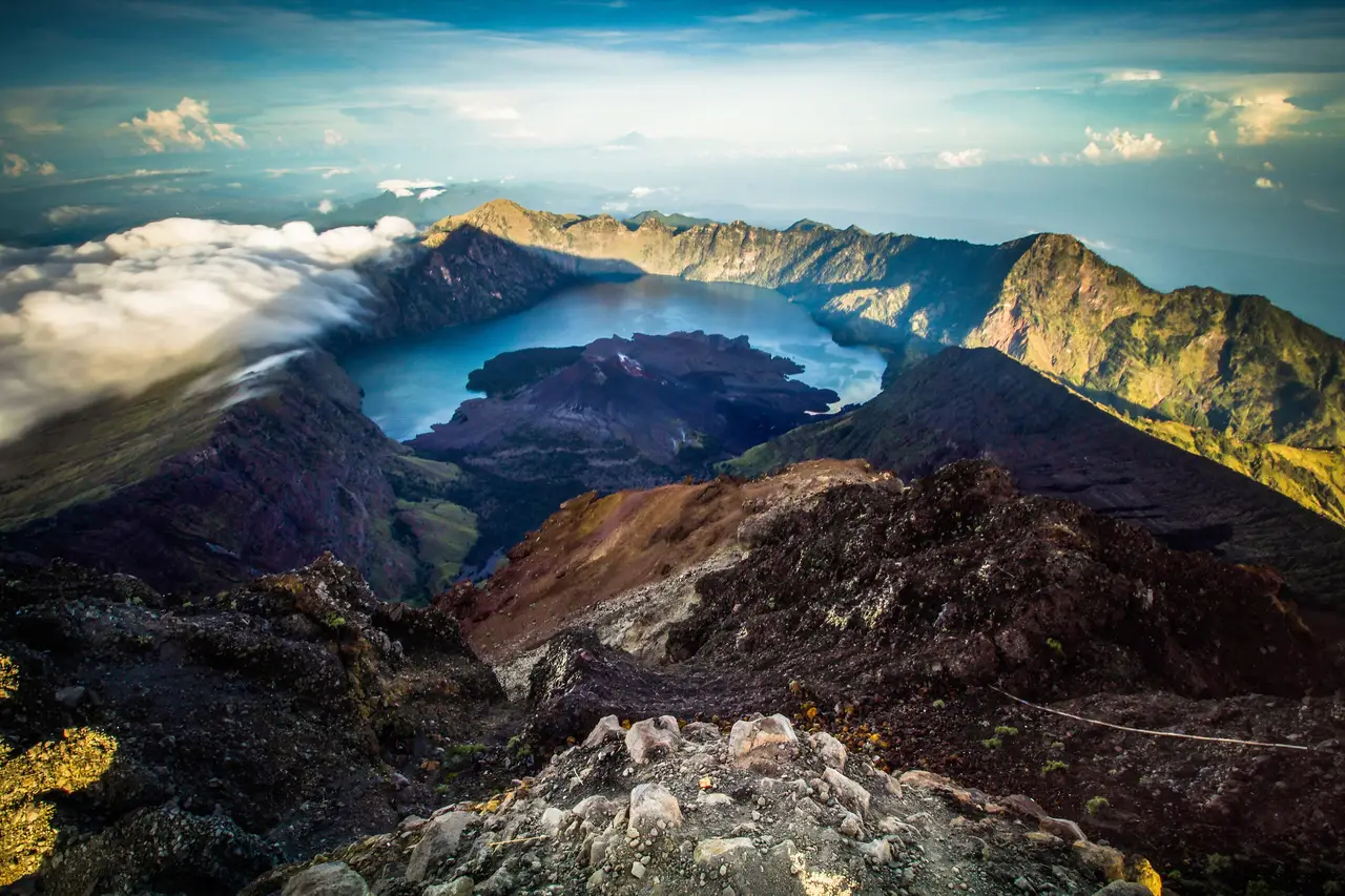 The crater lake of Mount Rinjani seen from the ridge